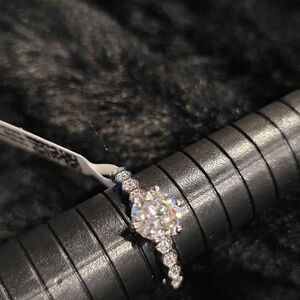1.0CTW VVSD Moissanite Solitaire in .925 Sterling Silver. Size 7